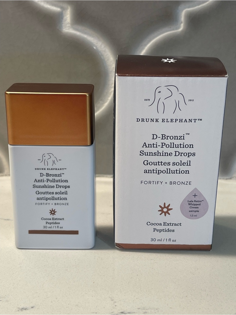Drunk Elephant D-Bronzi Sunshine Drops — White & Bronze Packaging